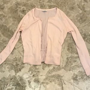 Cardigan with ruffle accent on back